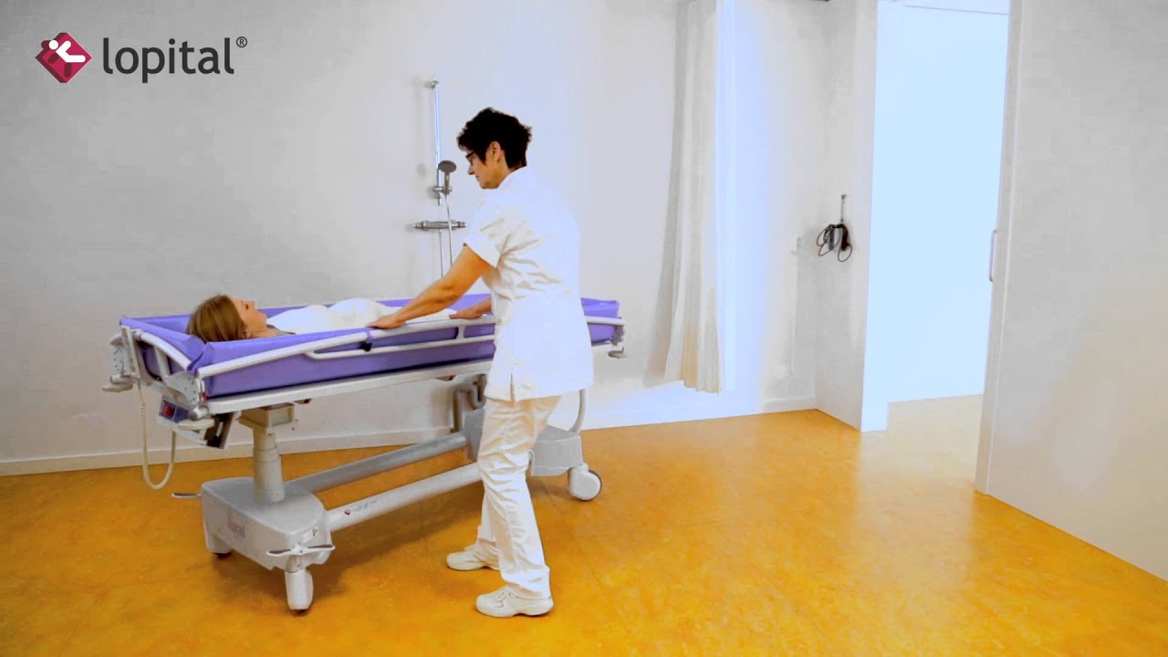 Lopital - Lehrvideo - Luxal Elektrisch h&ouml;henverstellbar Duschwagen (DE)
