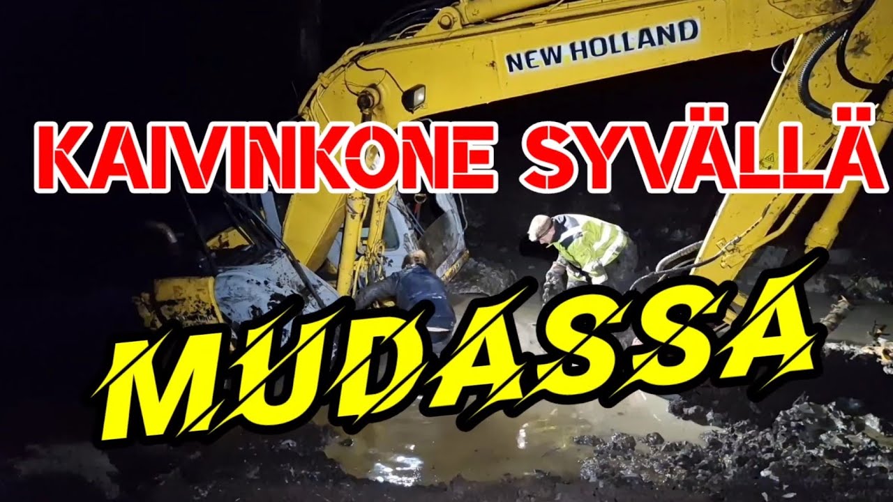 Kaivinkone syvällä mudassa, 200m päässä kovalta alustalta - Excavator stuck deep in the mud