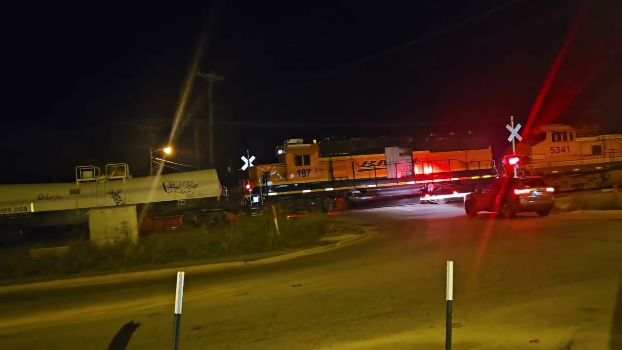 BNSF 7056 leads a manifest in Sherman Texas 