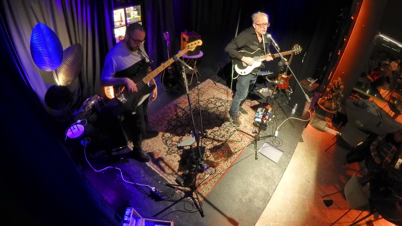 The Man In The Wool Overcoat - Luca & The Tautologists duo