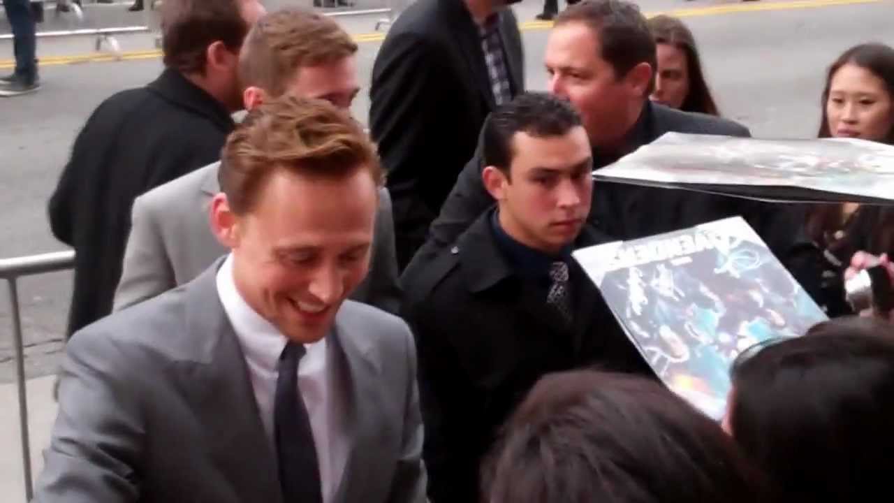 Tom Hiddleston gets a mysterious gift from fans at Marvel's 'The Avengers' Premiere