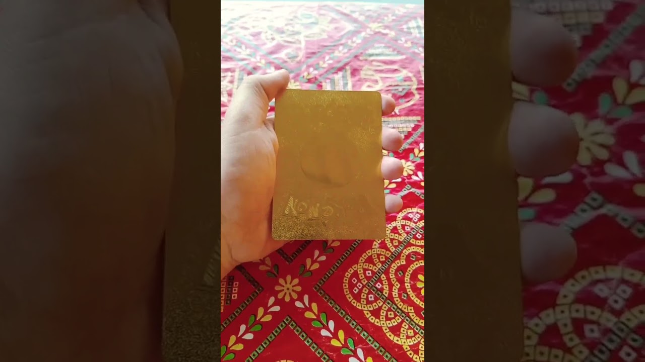 Gold Mega Charizard X Ex card...