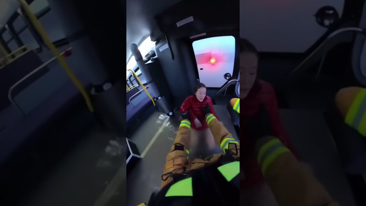 Firefighter Pulls Passengers from Flooded Bus