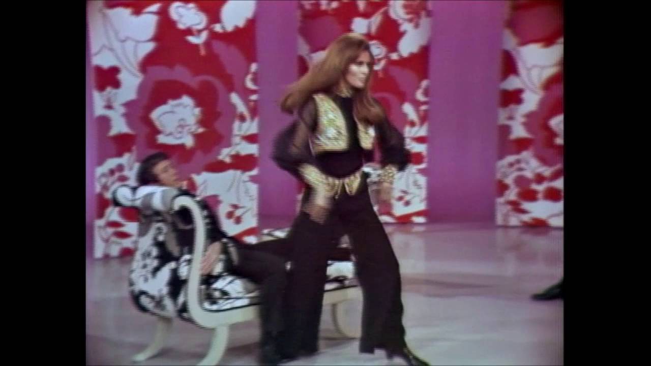 Raquel Welch & Jimmy Stewart flirting