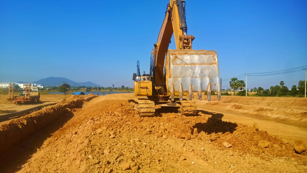 Ecavator BackFill Slop Road Canal