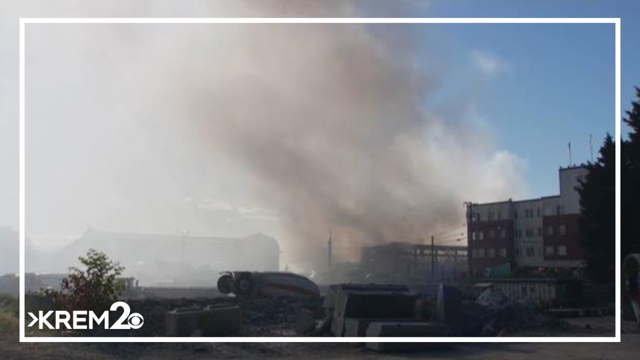 Over 100 firefighters battle large commercial warehouse fire in Ballard