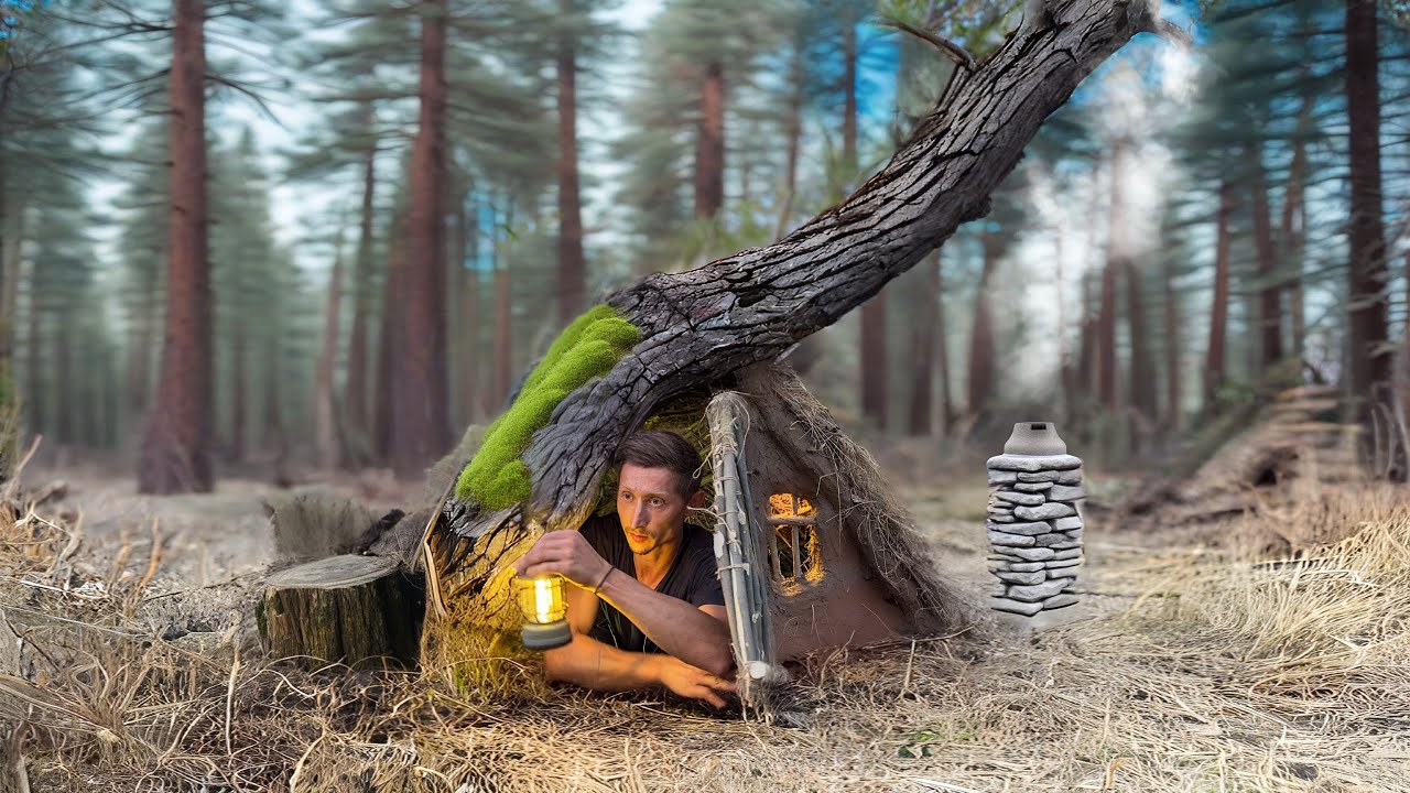 Building of a cozy dugout under the trunk of an old tree, a warm stove. Bushcraft
