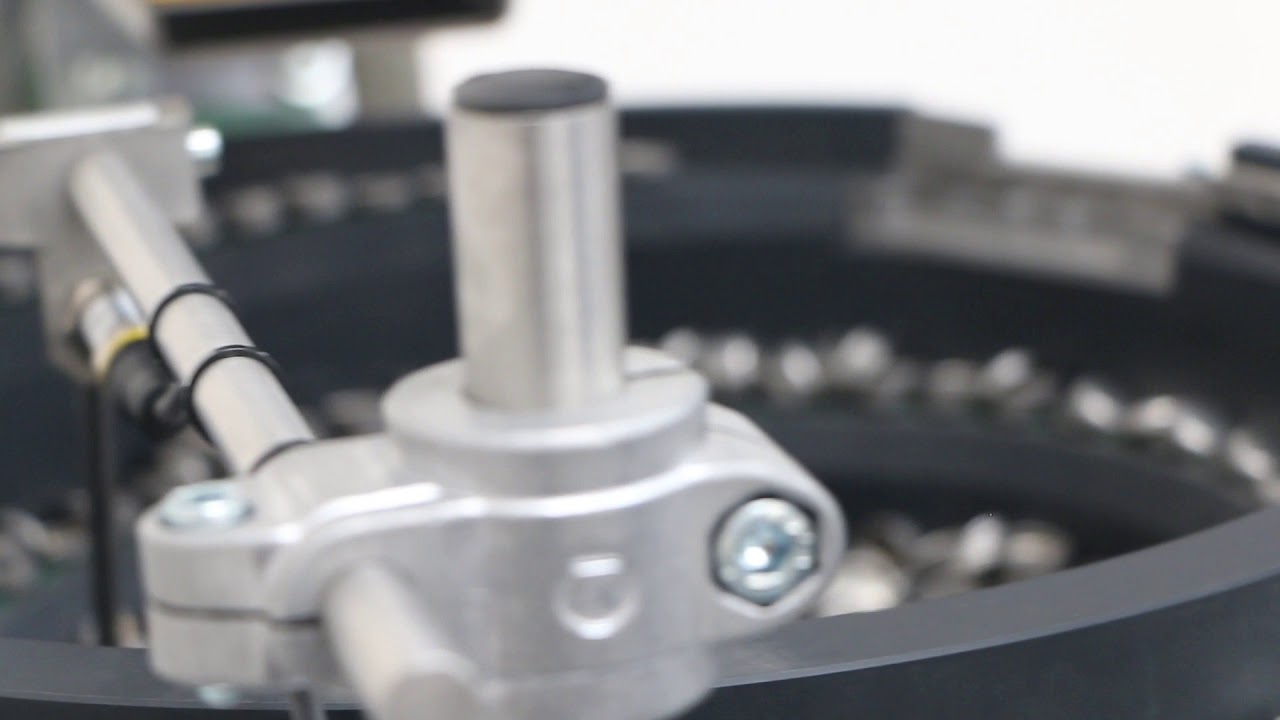 Sistema de posicionamiento por vibración para soporte tapón metálico · MDV