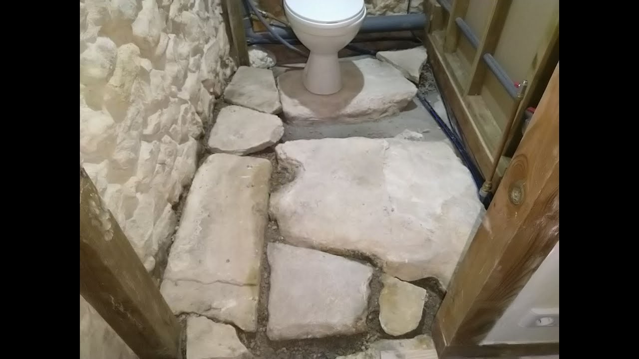 Laying the Corral loo stone floor. Brief solar update