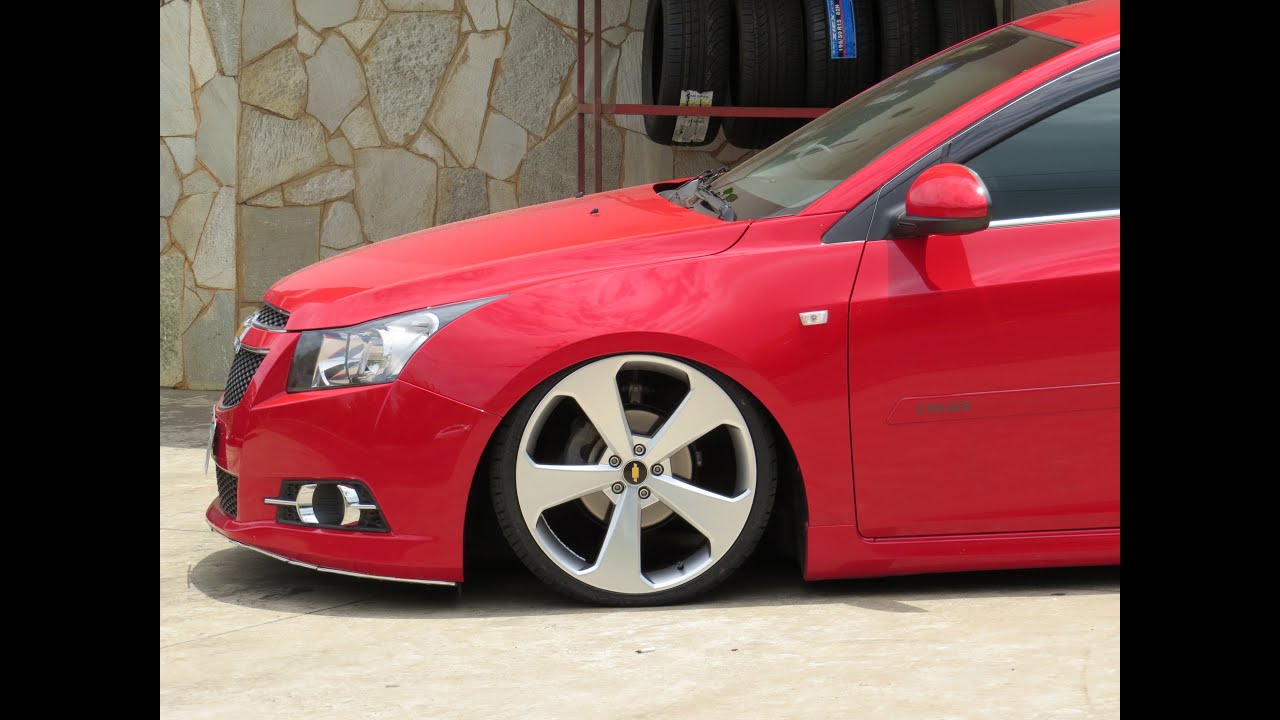 Cruze Hatch + Rodas 20