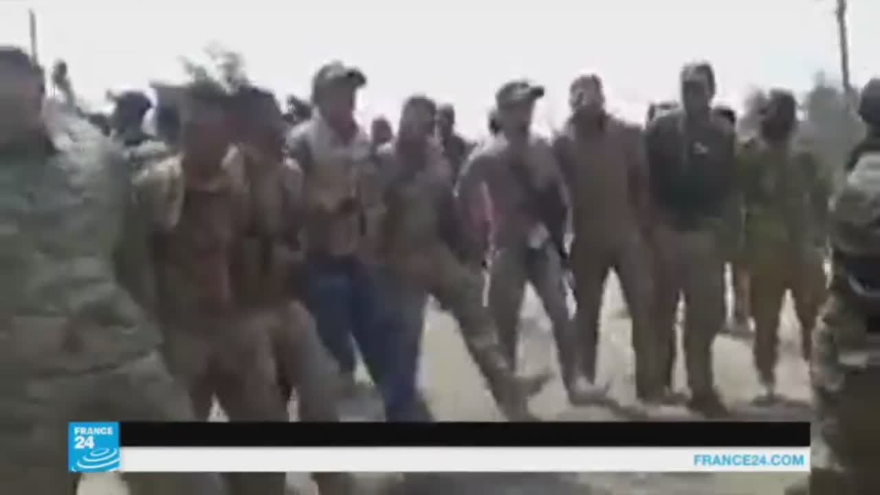 القوات العراقية تحتفل بعد السيطرة على القيارة