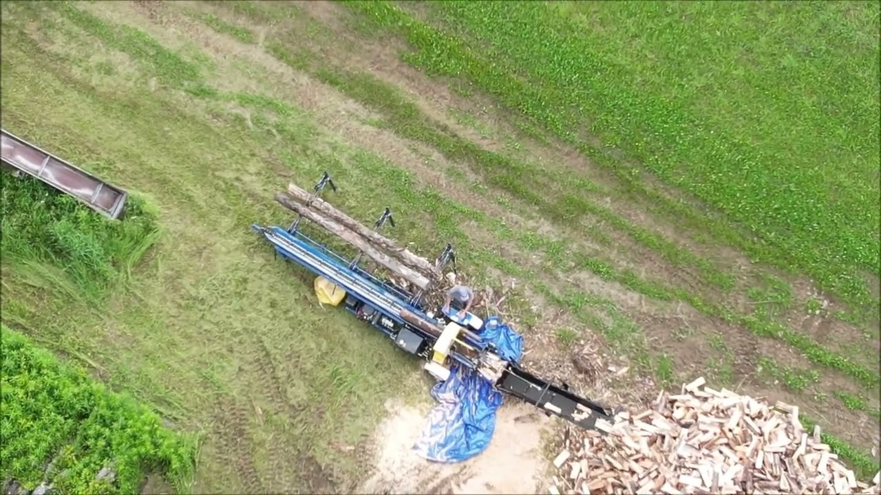 Splitting hardwood firewood with a SC-12XP Dyna Wood Processor - running the drone at the same time.