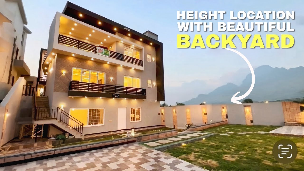 inside a 8.15 Crore 23 Marla hilltop house  with extra backyard in bahria town Islamabad : for sale