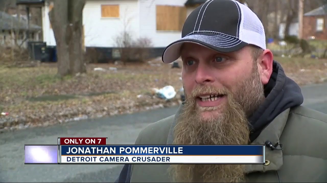 Man caught on video dumping car parts in Detroit