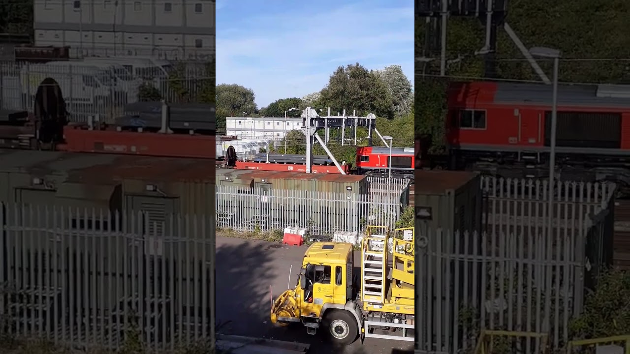 DP class 66 frieght train leaving the yard