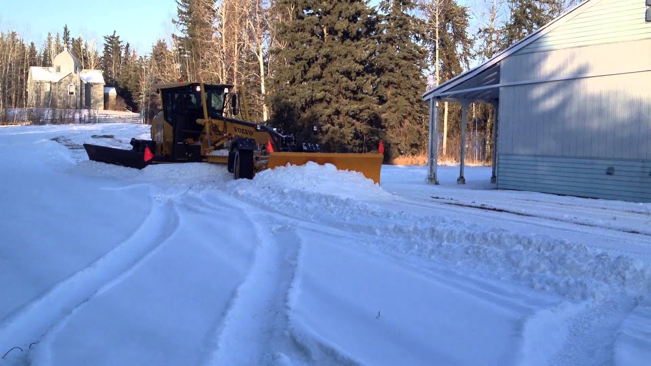GB10   front, middle, side wing blades all pushing snow