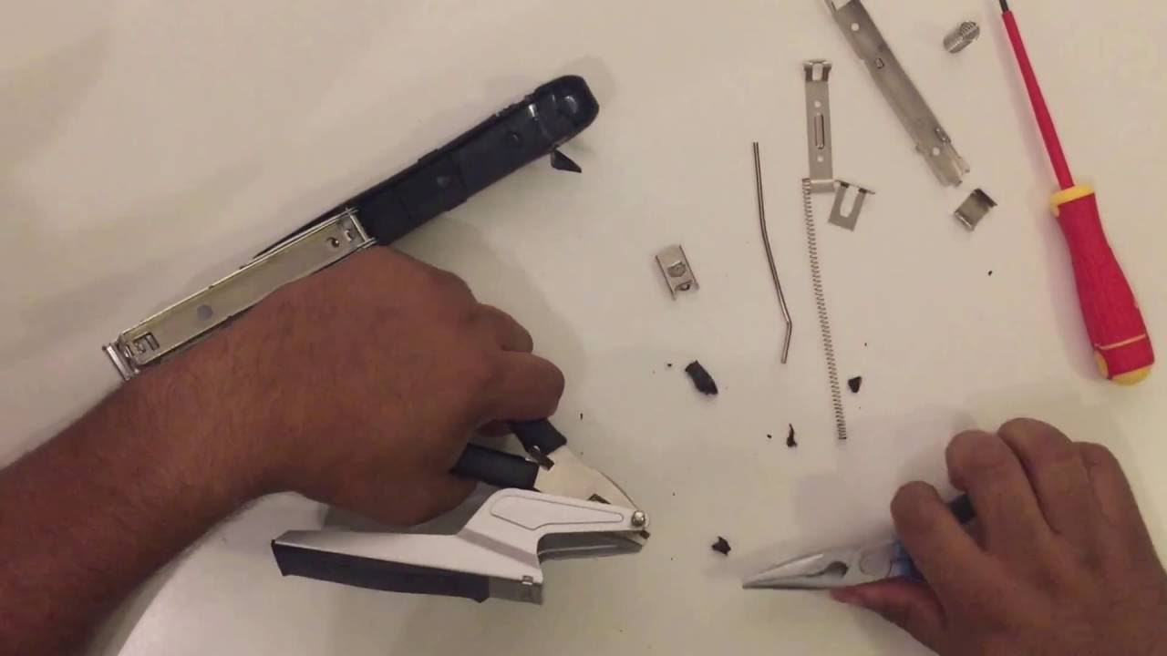Disassembling a stapler