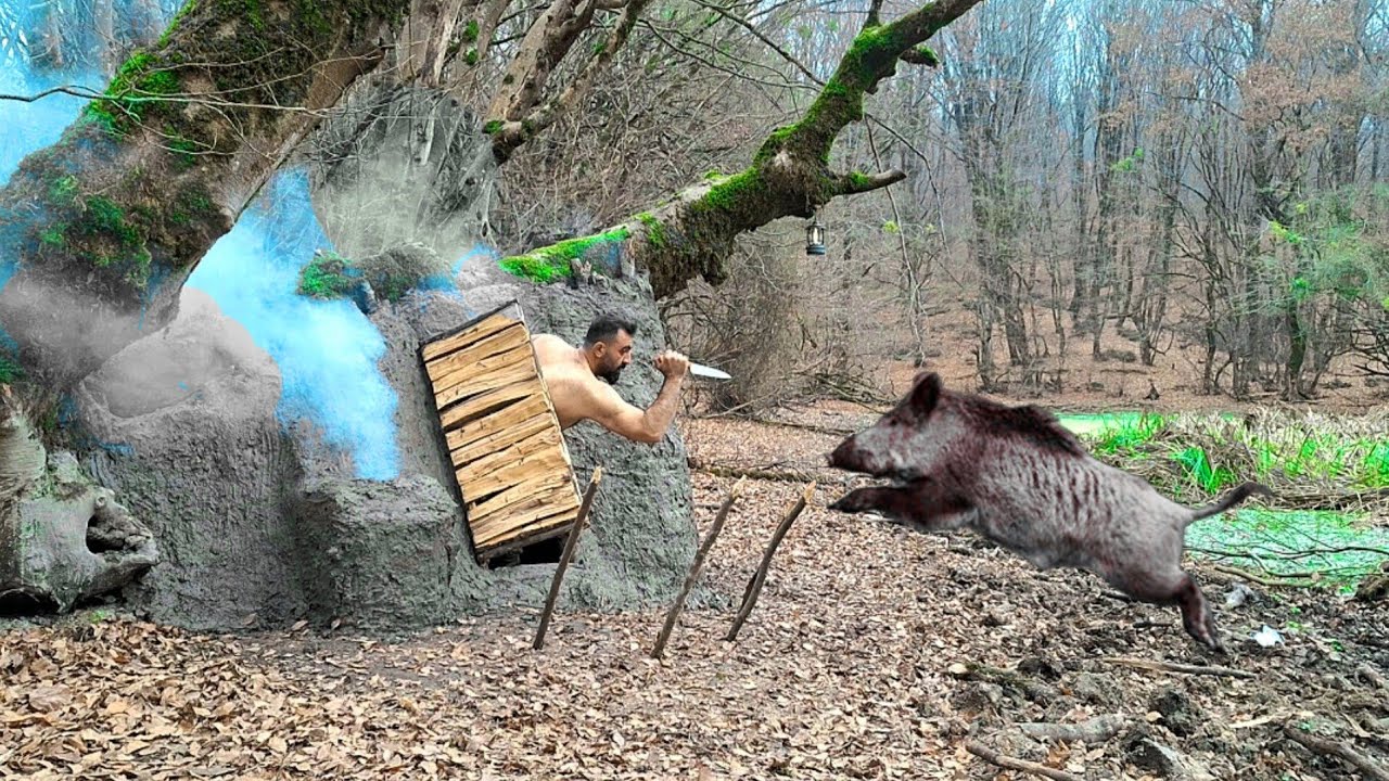 Building a hidden shelter under a tree with hand tools . A fight with a wild boar 🐗