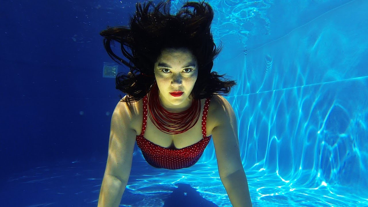 Metallic red leggings fashion shoot underwater. (Ambient sound) #underwaterphotography #underwater