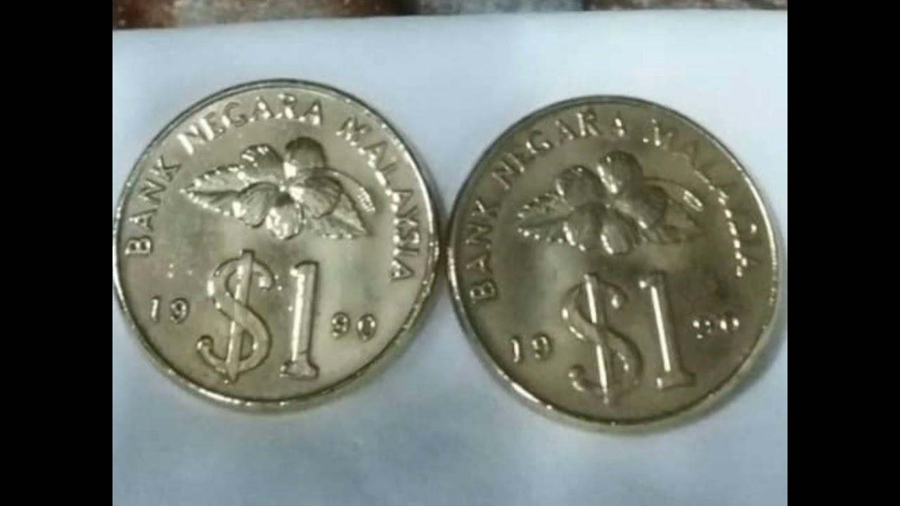$1 Malaysia 'gold' coin, 1990,for auction, two pcs, good condition, RM?  0163917637