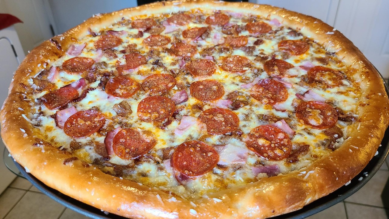 Homemade Meat Lover's Pizza | Made with 5 different types of meat 2 different types of cheeses.