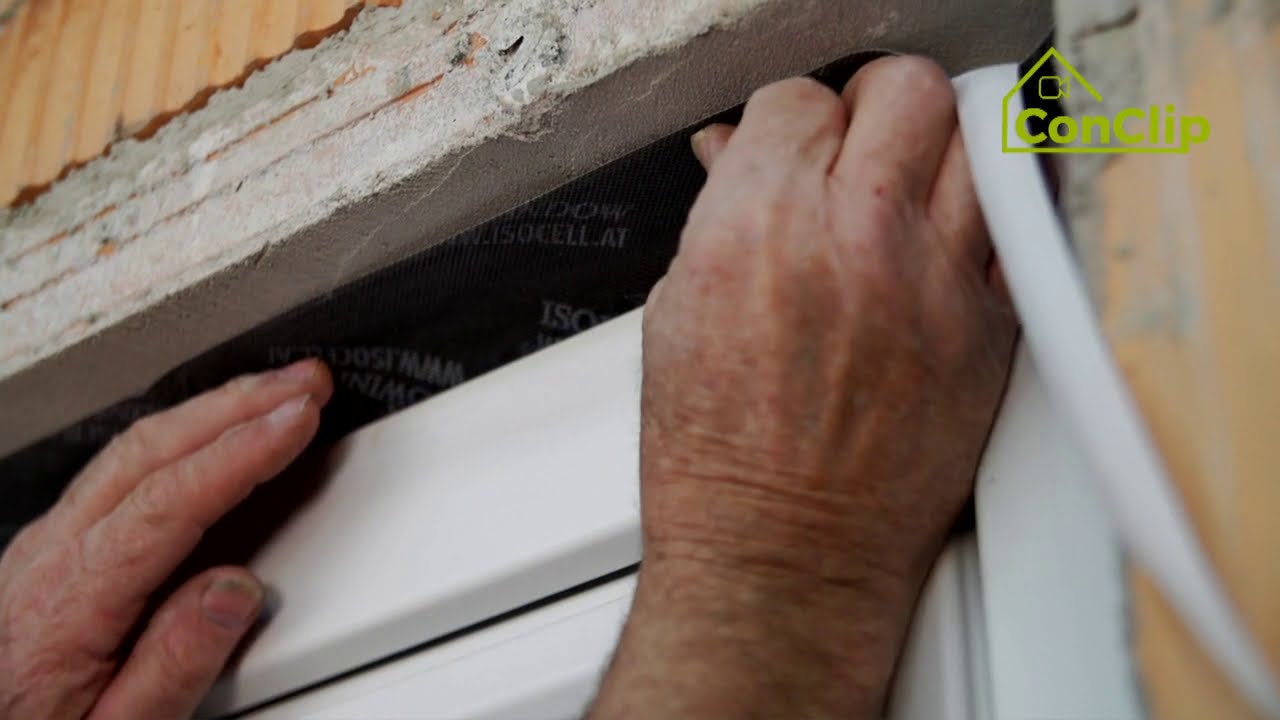 Étanchéité à l'air : Pose d'une fenêtre, mur en brique avec isolation extérieure