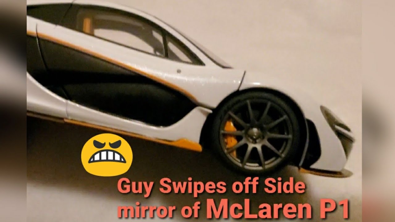McLaren P1 | GUY BREAKS OFF PASSENGER SIDE VIEW MIRROR