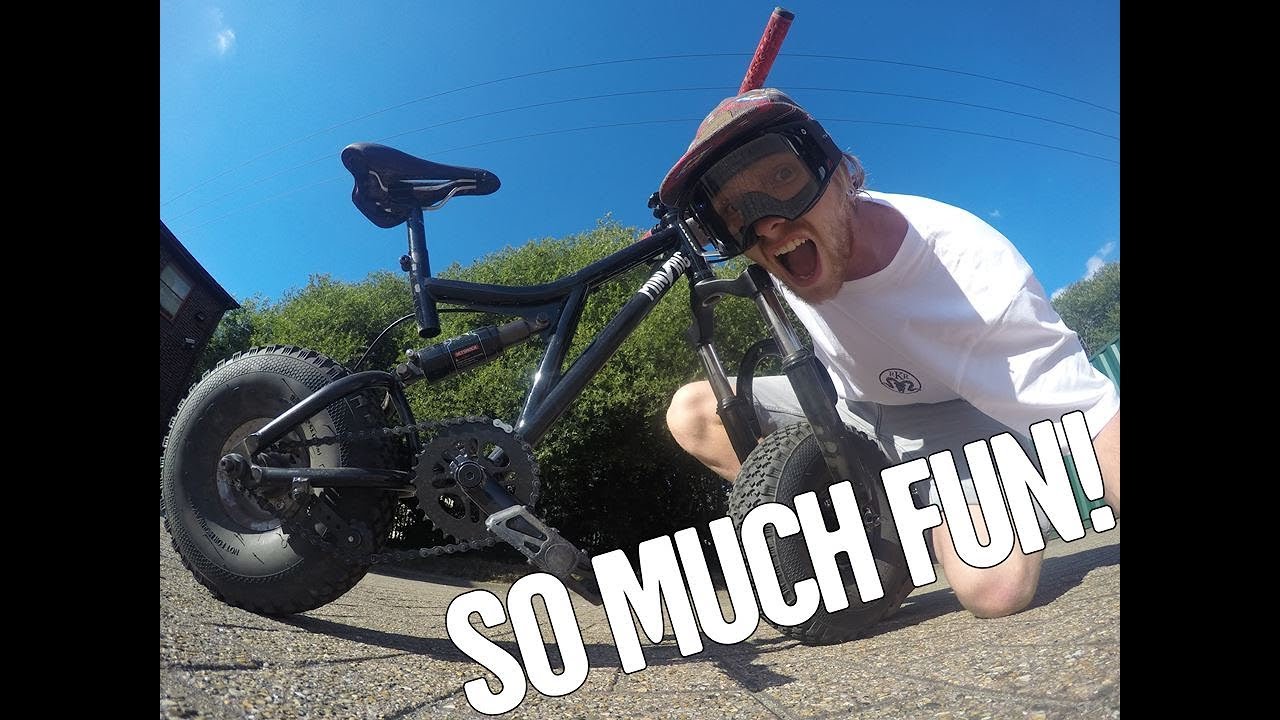 Mini downhill mountain bike massive jumps.