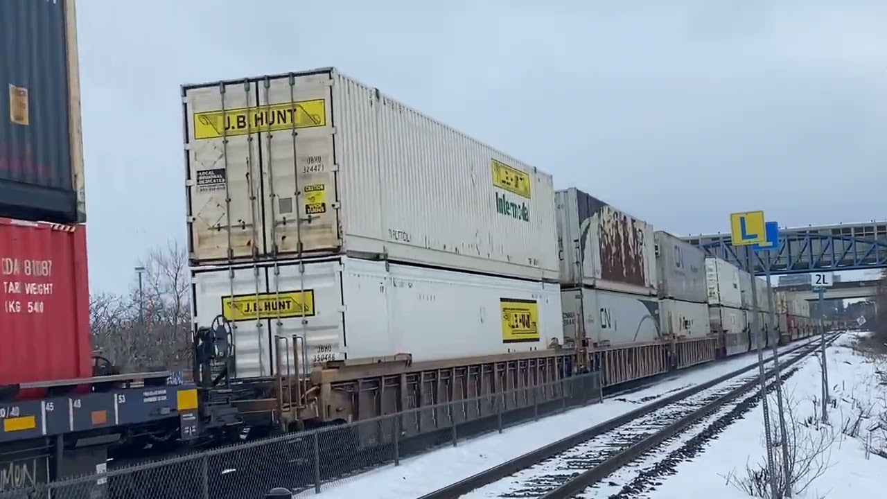 Every Child Matters Sticker! CN Z112 with an inspection boxcar lead by 2956 & 2536 by Langstaff