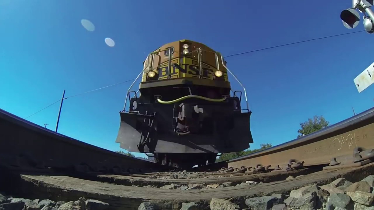 Camera under the train video. Various BNSF locomotives, steam locomotives, electric trains