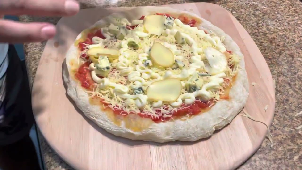 Pizza no forno do fogão parte 2 : pré-assando a massa.