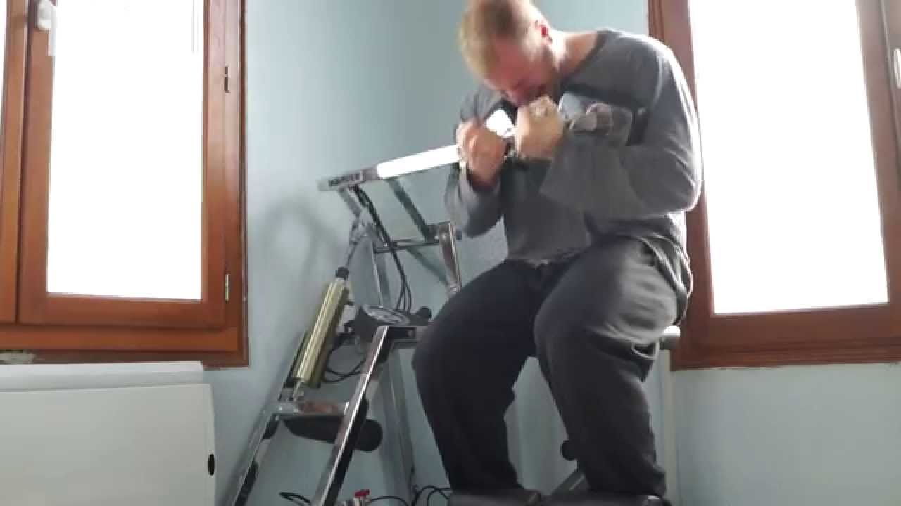 Michael Gundill trains abs in a descending set fashion on a Keiser abdominal machine