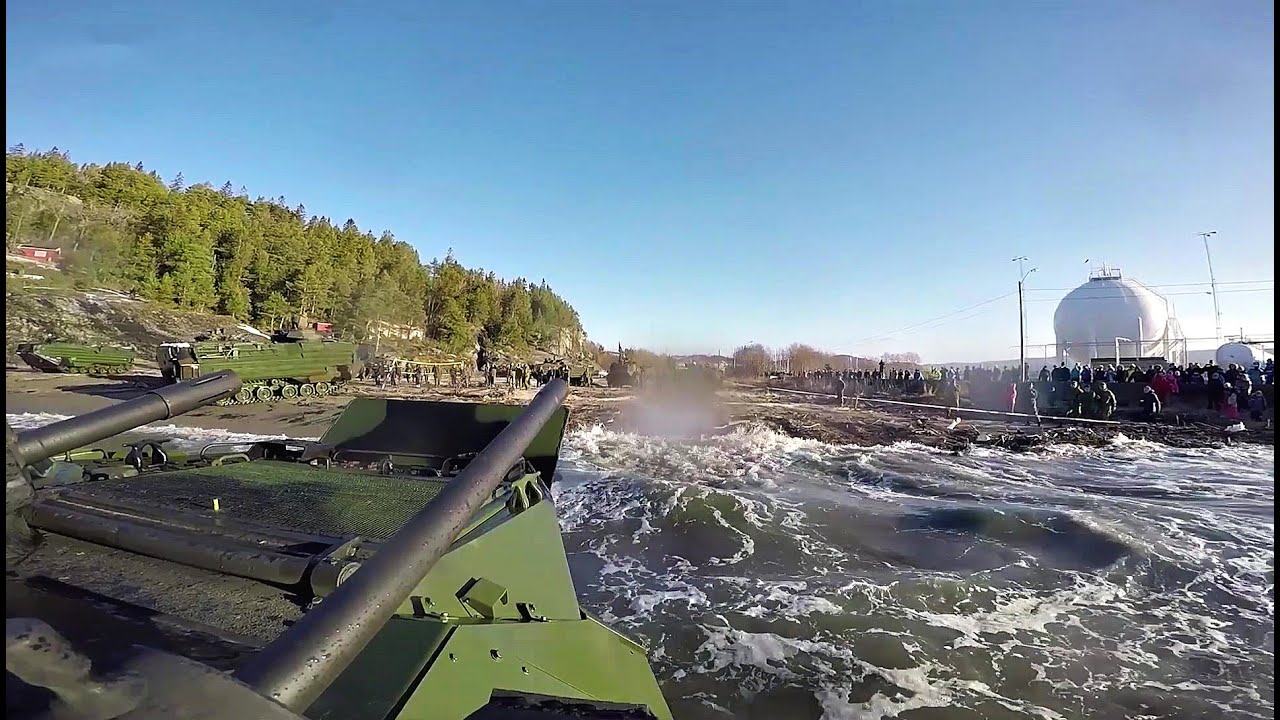 US Marines Assault Amphibious Vehicles Go for a Swim in Norway
