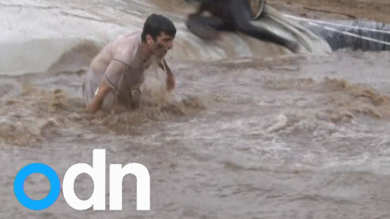 25,000 mud lovers get down and dirty at Paris Mud Day