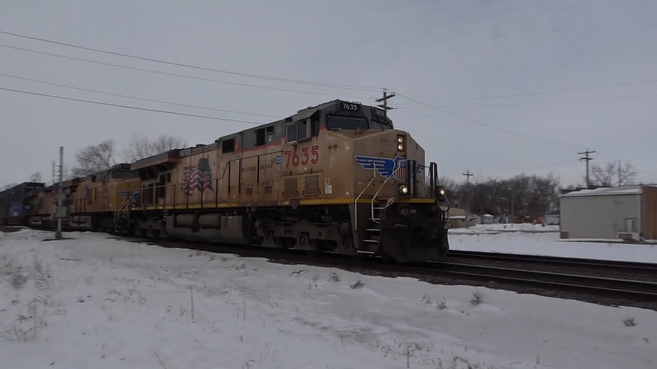 Back to back UP crossover trains! Fast priority train and an empty coal train with CNW cars!!