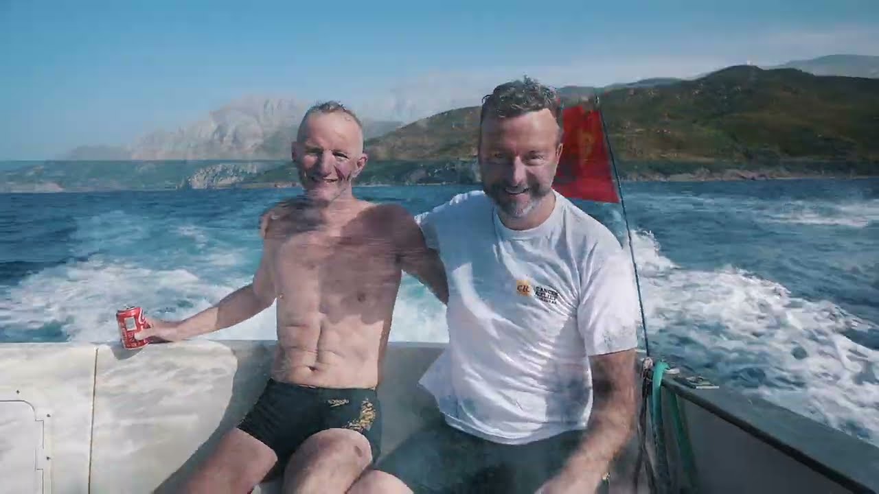 2 swimmers cross from Tarifa to Morocco.