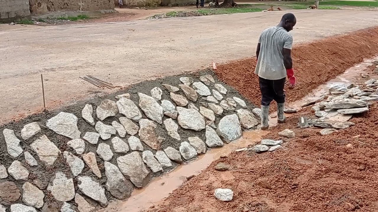 How to Construct V-shaped Drainage & Protect Embankment | Stone Pitched Drainage