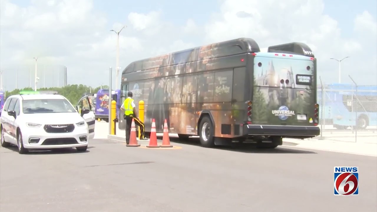 Crews extinguish flames after 2 Universal Orlando buses catch fire