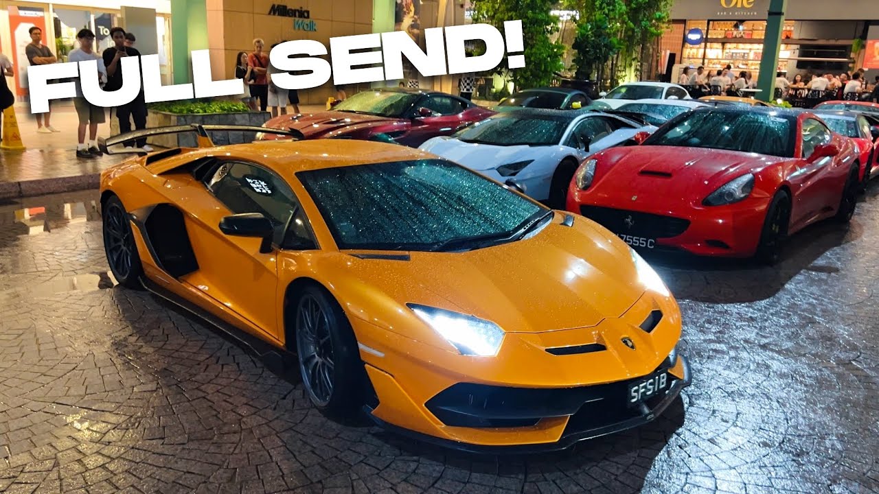 Громкие Lamborghini и Ferrari мчатся по дождю! Суперкары Сингапура встречаются на Millenia Walk