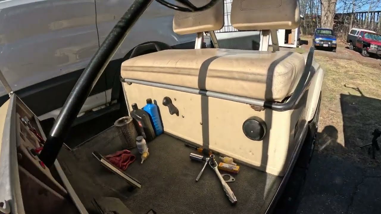 Oil change on my Club Car golf cart.
