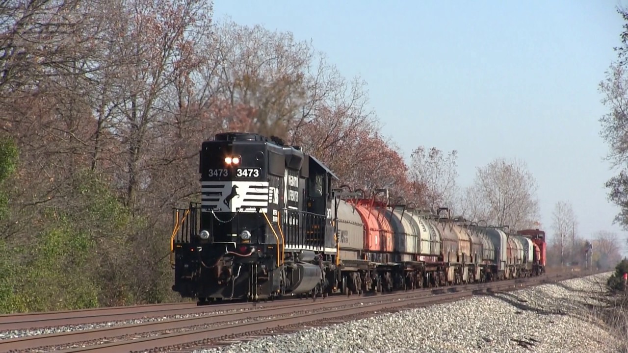 Amtrak Races Freight Train with Caboose!