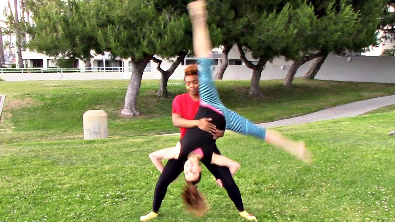 How To Do A Double Cartwheel - 2 Person Acro Cartwheel Tutorial