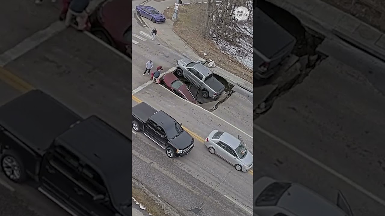 Omaha traffic camera captures sinkhole swallowing two vehicles in Nebraska
