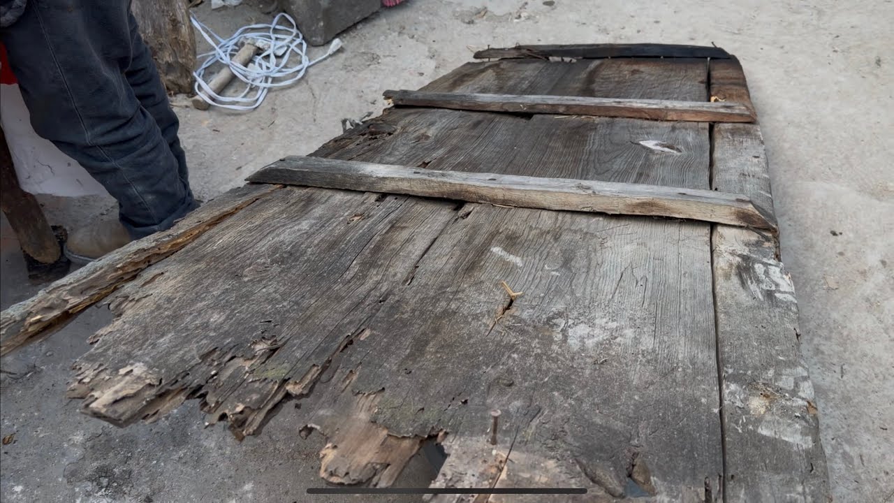 La puerta de madera de 100 años 