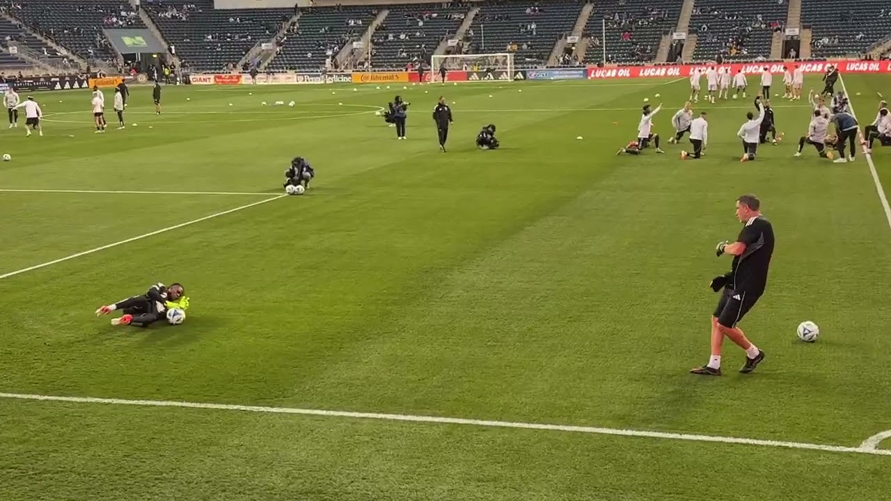 Andre Blake and his goalkeeper coach prepare for a match against Orlando SC.