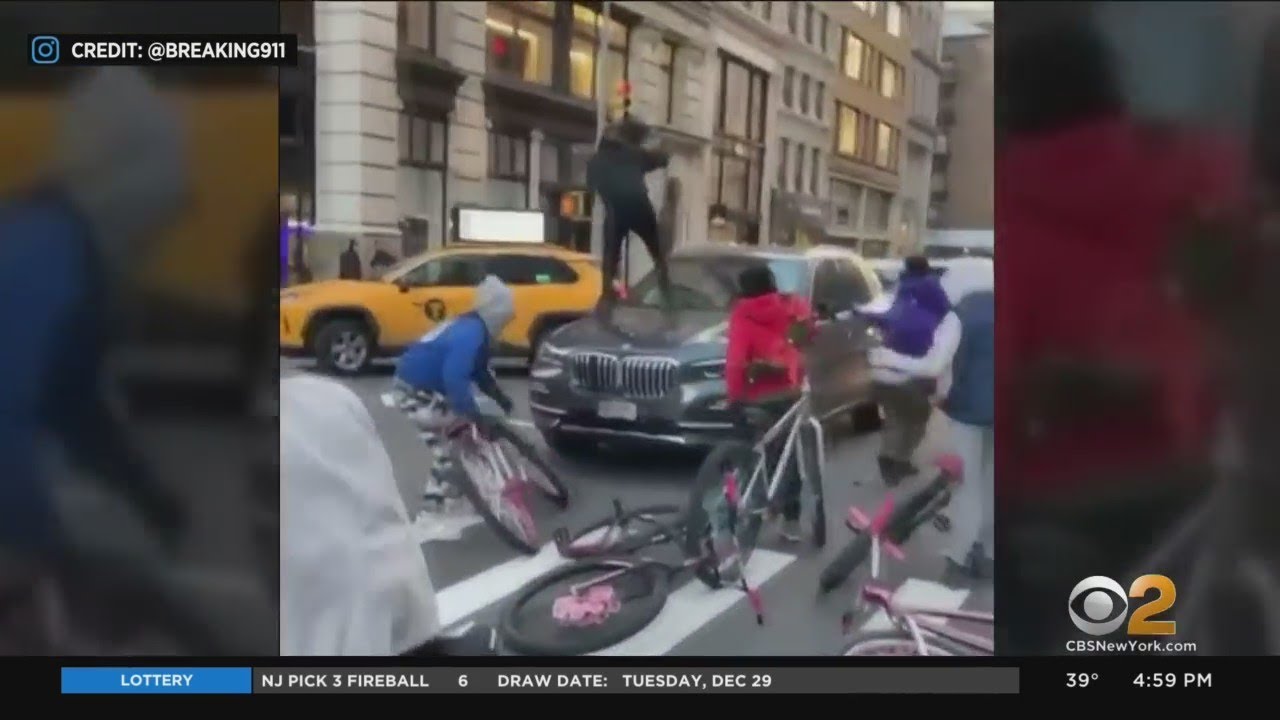 Caught On Video: Cyclists Surround, Jump On SUV In Midtown