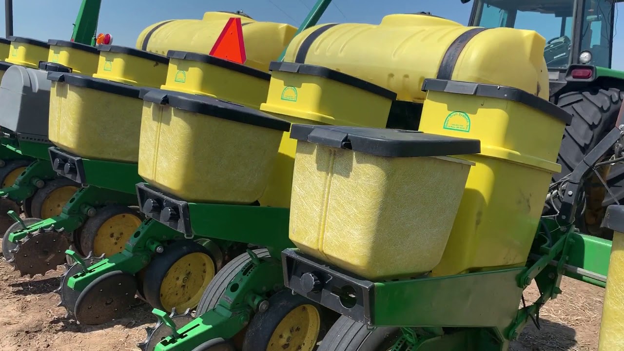 Resetting the lift height on a JD 7200 planter, planting soybeans in NE.