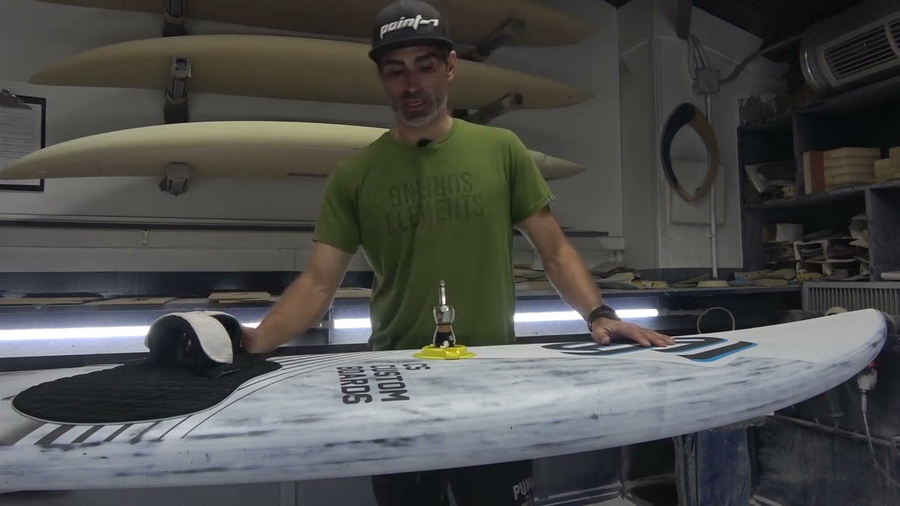 Placing mast base on a windsurfing wave board
