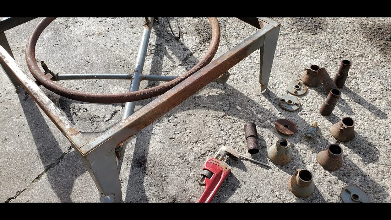 Cleaning And Repairing A Used Olympic 2831G Updraft Kiln.