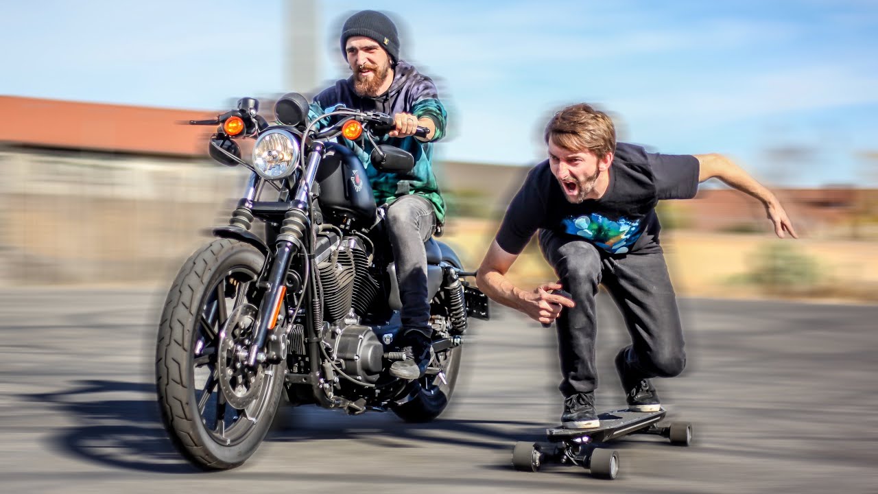 The World’s Fastest Electric Skateboard VS a Harley Davidson Motorcycle